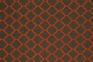 ALEGA, geometrik deseni ve güçlü dokusuyla mekânlara modern ve enerjik bir atmosfer katar. Estetik ve dayanıklı döşemelik kumaş seçeneği.